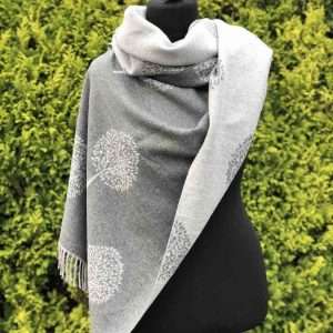 Grey Mulberry scarf worn as a blanket scarf