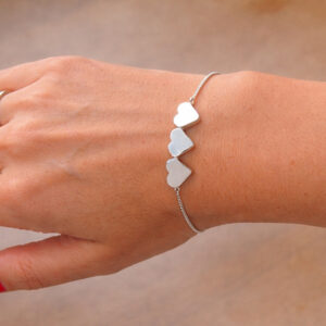 silver heaarts slidier bracelet on wrist