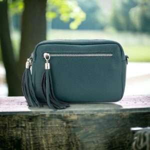 Teal leather crossbody bag with tassel