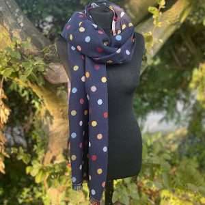 navy cashmere blend big spots reversible scarf on manikin