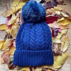navy bobble hat with faux pompom