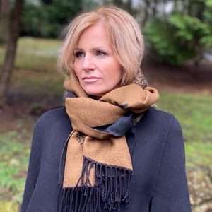 reverse side of mulberry black scarf on model