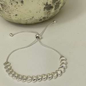 silver glossy hearts friendship bracelet by gracee jewellery