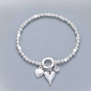 Two heart pendant stretchy bracelet with bead detail