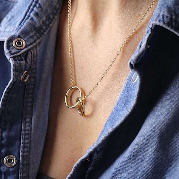 smooth circles gold plated necklace on ladiesneck