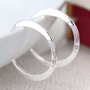 hammered silver hoop earrings