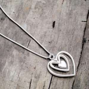 treble heart pendant silver necklace on snaked chain