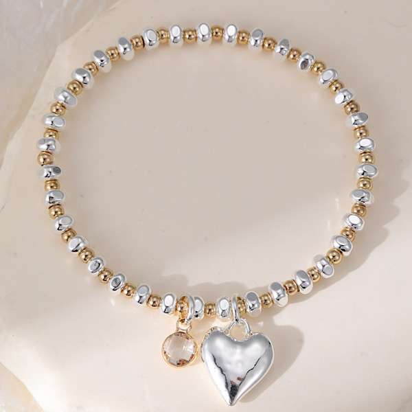 rosegold and silver puffed heart stacking bracelet