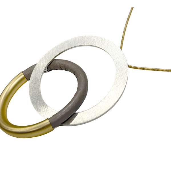 unusual pendant long necklace with faux leather detail