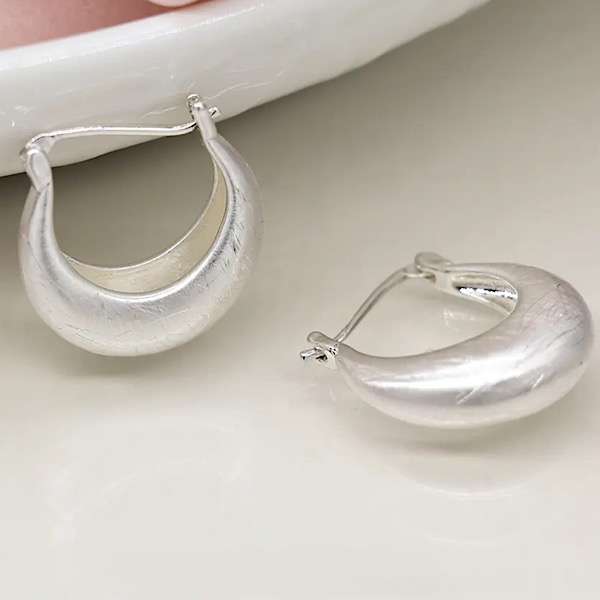 scratched silver earrings