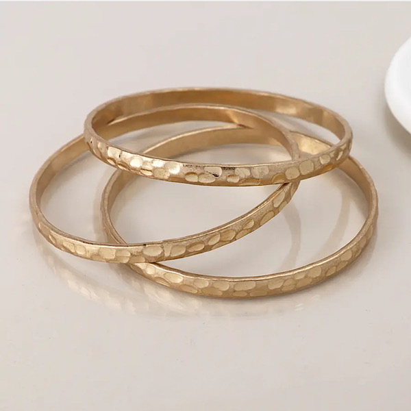 Gold triple bangle