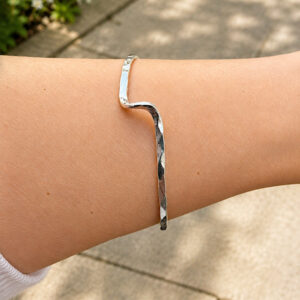 recycled sterling silver open bangle on wrist