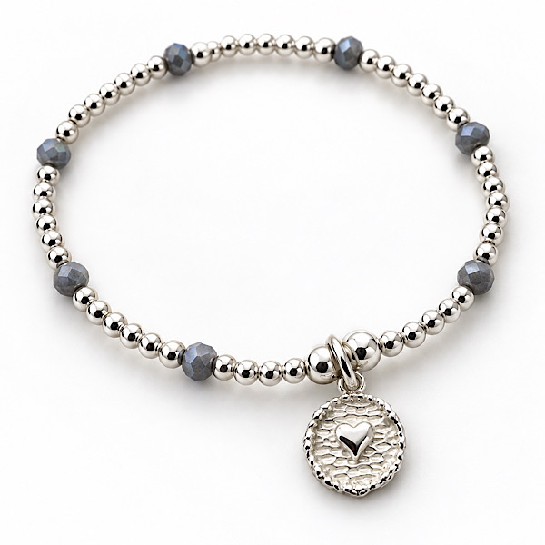 silver plated bracelet with textured heart charm
