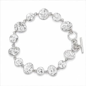 Silver hammered disc bracelet with T-bar closure