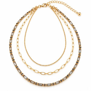 smoky crystal necklace with gold tone layered chains