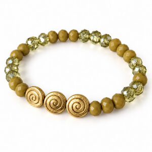 green stretch bracelet with gold tone spiral beads